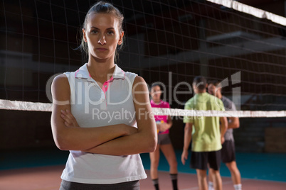 Portrait of female volleyball player with arms crossed
