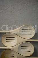 Directly above shot of spatulas on table
