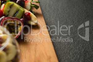 Various fruits on chopping board