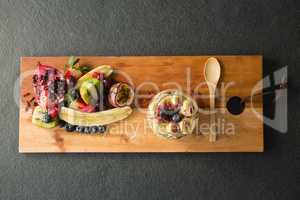 Various fruits on chopping board
