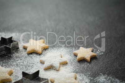 Close up of star shape cookies with pastry cutter