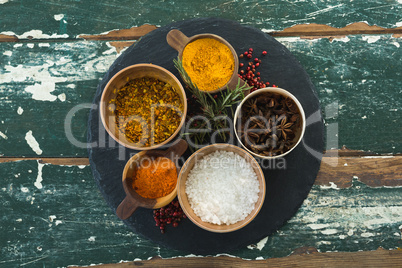 Various spices arranged in board