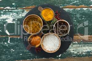 Various spices arranged in board