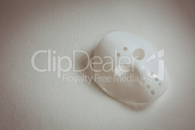 Face mask over white background