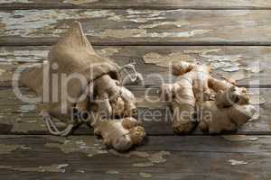 High angle view of gingers with burlap on weathered table