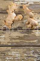 Directly above view of gingers on weathered table