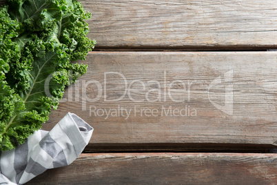 Cropped image of kale vegetable on table
