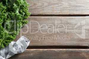 Cropped image of kale vegetable on table