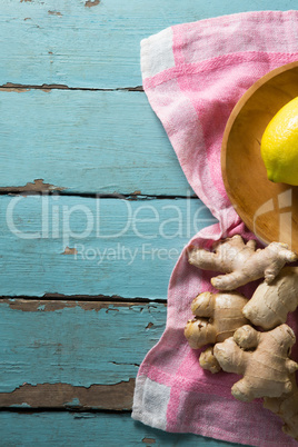 Close up of lemon and ginger on table