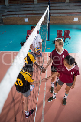 Female players shaking hands after match