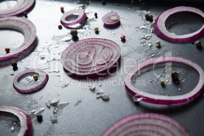 Close-up of onions in tray