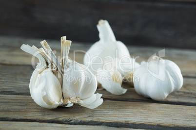 Garlics on wooden table