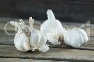 Garlics on wooden table