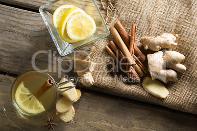 High angle view of lemons with ginger tea