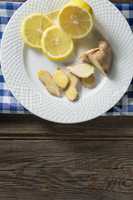 Lemon and ginger slices in plate