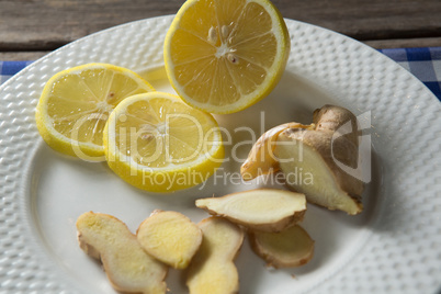 Close up of lemon and ginger in plate