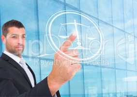 businessman pointing at justice icon