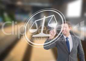 businessman pointing at justice icon