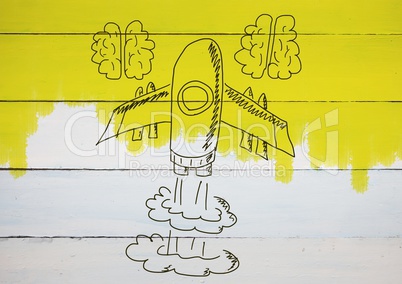 hand-drawn rocket and brains on wood