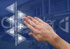 Hand touching smart home interface at home