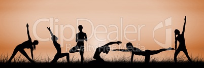 yoga group silhouette at sunset