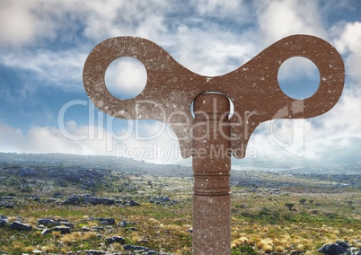 Rustic Key over rough barren landscape