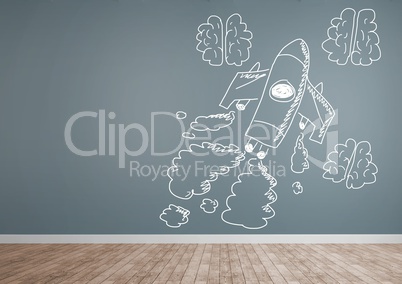 hand-drawn rocket and brains on grey wall