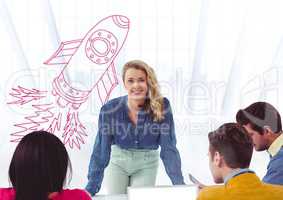 Creative woman and people with hand-drawn rocket