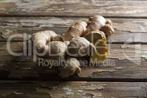 Close up of fresh gingers on damaged table