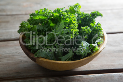 Kale in bowl on table