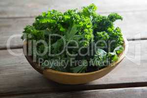 Kale in bowl on table