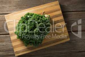 Fresh kale on cutting board