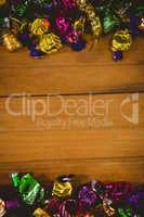 Colorful wrapped chocolates on table during Halloween