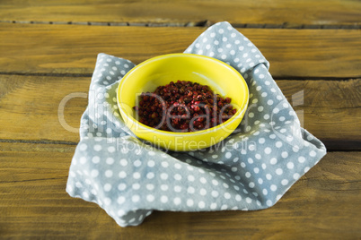 Pink peppercorn in bowl