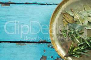 Bay leaves and rosemary in plate