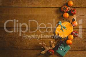 Overhead view of food with autumn leaves on table