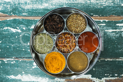 Typical spice box with multiple containers