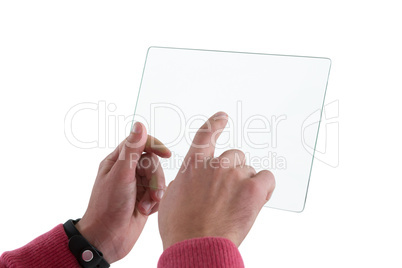 Close-up of man using glass digital tablet