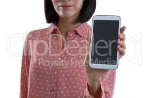 Mid-section of woman showing mobile phone