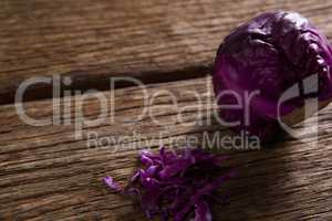 Red cabbage on wooden table