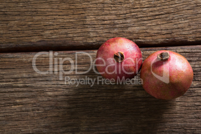 Pomegranates on a wooden table