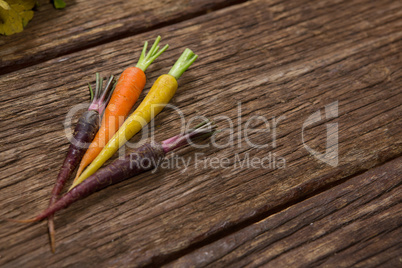 Root vegetables on wooden table