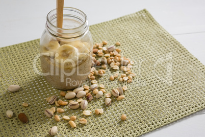 Healthy breakfast in jar on place mat