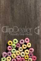 Froot loops arranged on wooden table