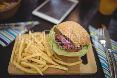 High angle view of fresh fast food served on table in cafe