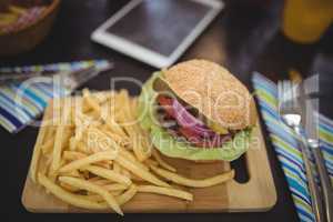 High angle view of fresh fast food served on table in cafe