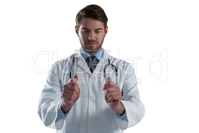 Male doctor using glass digital tablet