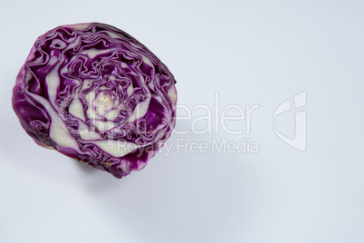 Halved red cabbage on a white background