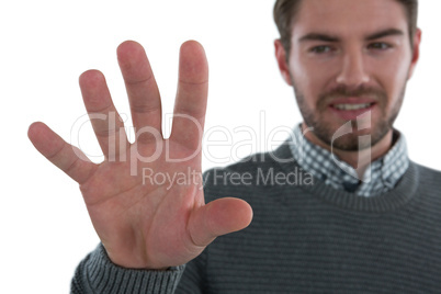 Man gesturing against white background