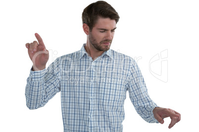 Man pretending to touch an invisible screen